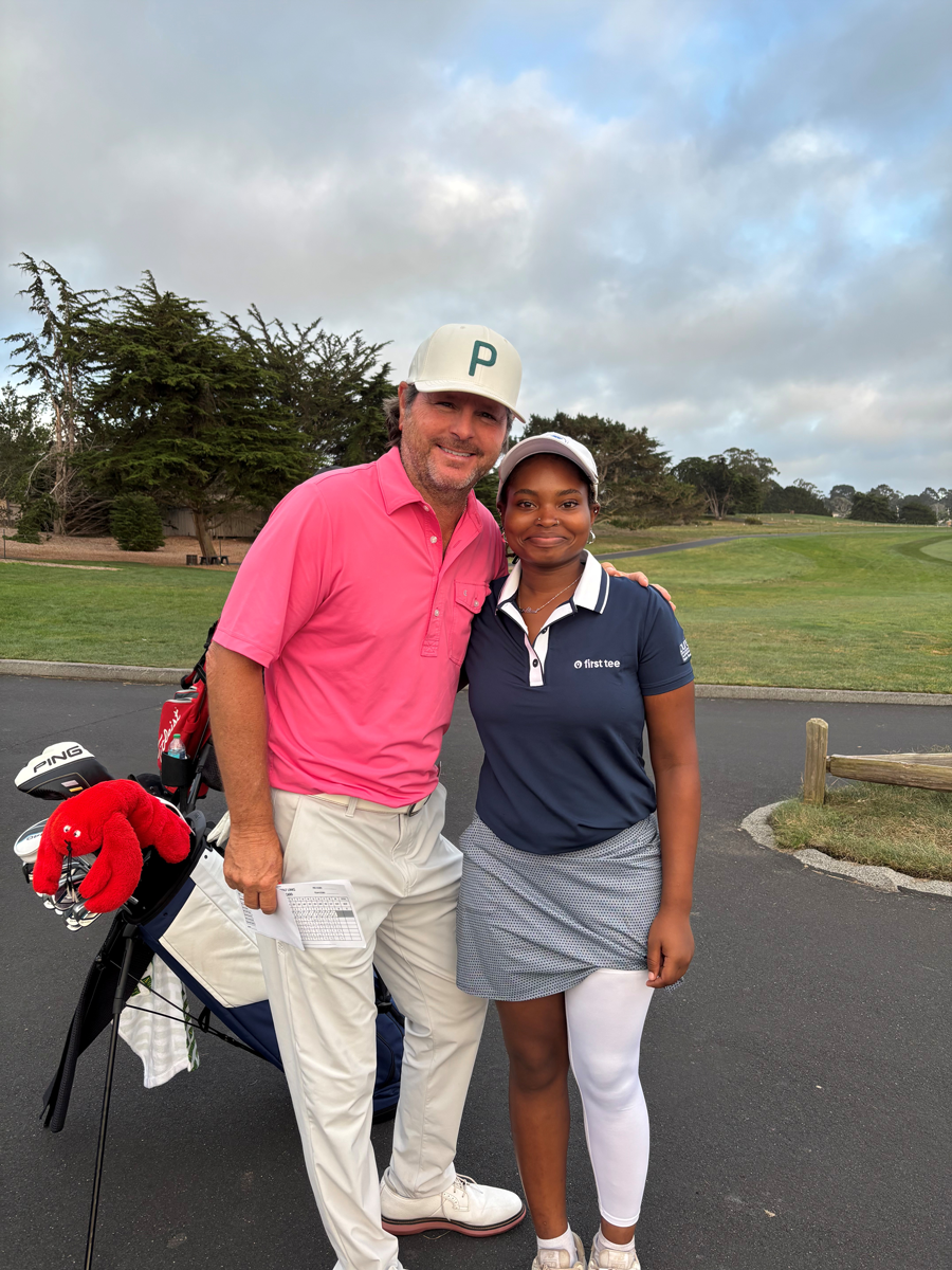Mark Walker posing with a young lady